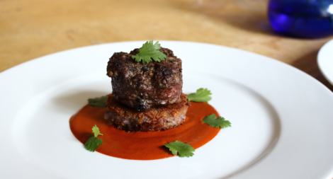 Grilled Chopped Steak with Dried Red Chili Sauce and Blue Corn Pozole Polenta
